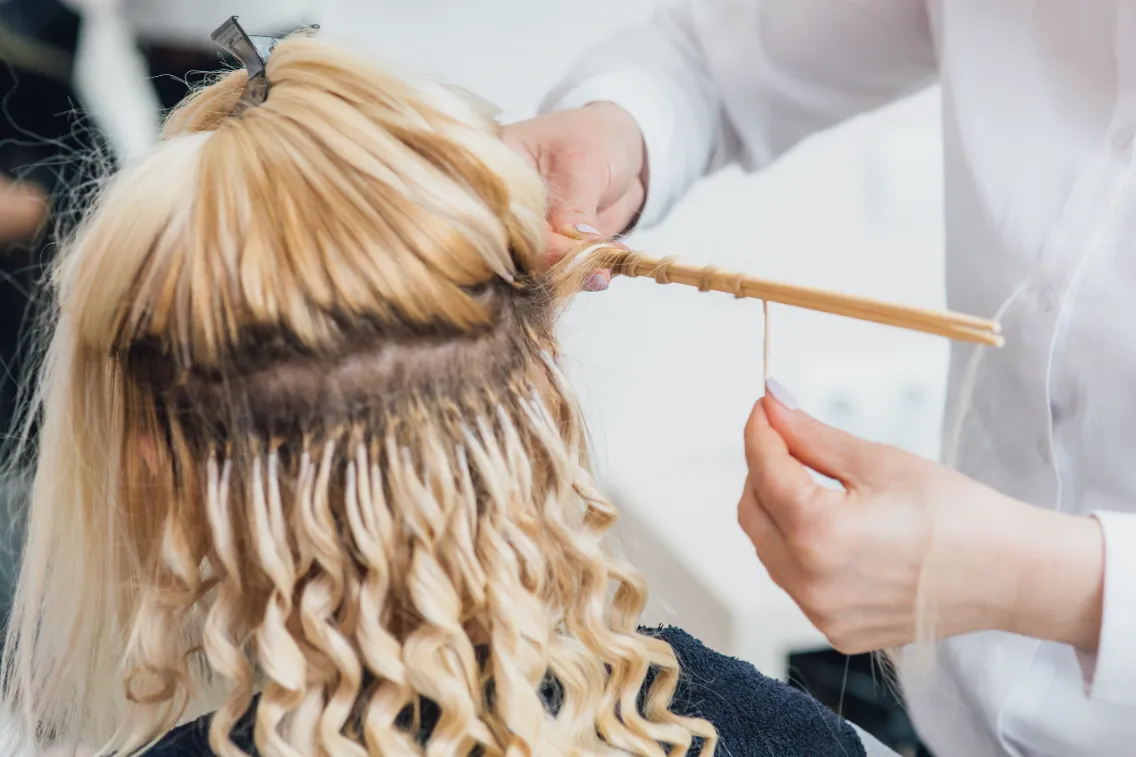 hairdresser-makes-hairstyle-close-up-on-blond-hair-2024-10-18-10-00-44-utc (1)